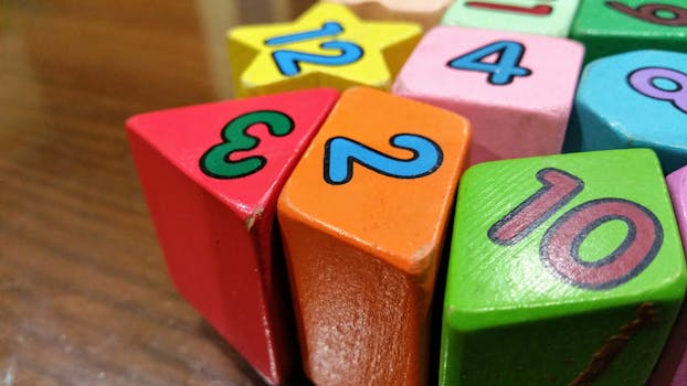 Close-up view of colorful wooden blocks with numbers for educational use.